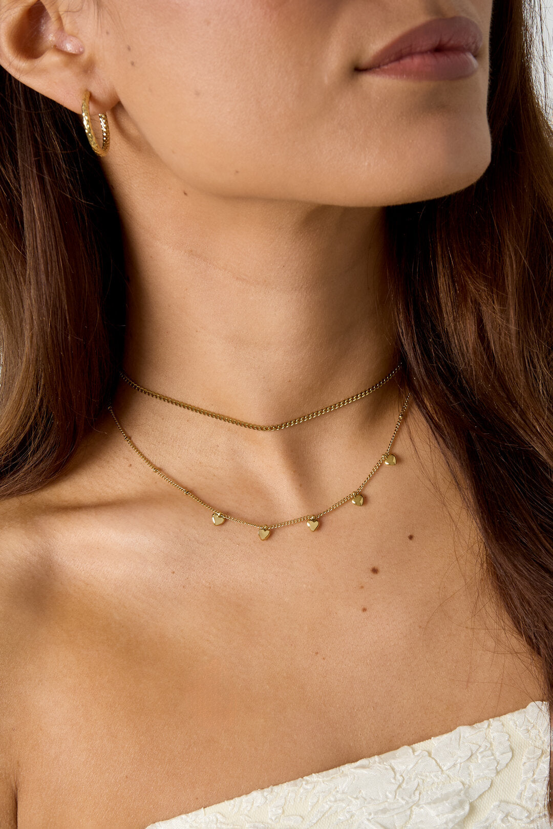 Minimalist necklace with small hearts
